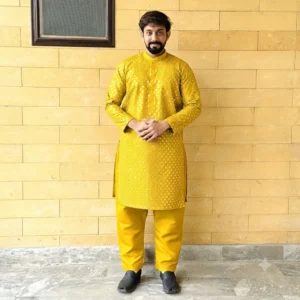 Shop Haldi Mustard Yellow Raw Silk Kurtas for Men Wedding Wear Kurta with premium raw silk, ivory trousers, and elegant style for Haldi, Nikkah, Eid, and weddings.